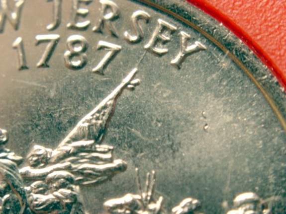 1999-D-New-Jersey-St.-Quarter---Extended-Flag-Pole-Die-Gouge